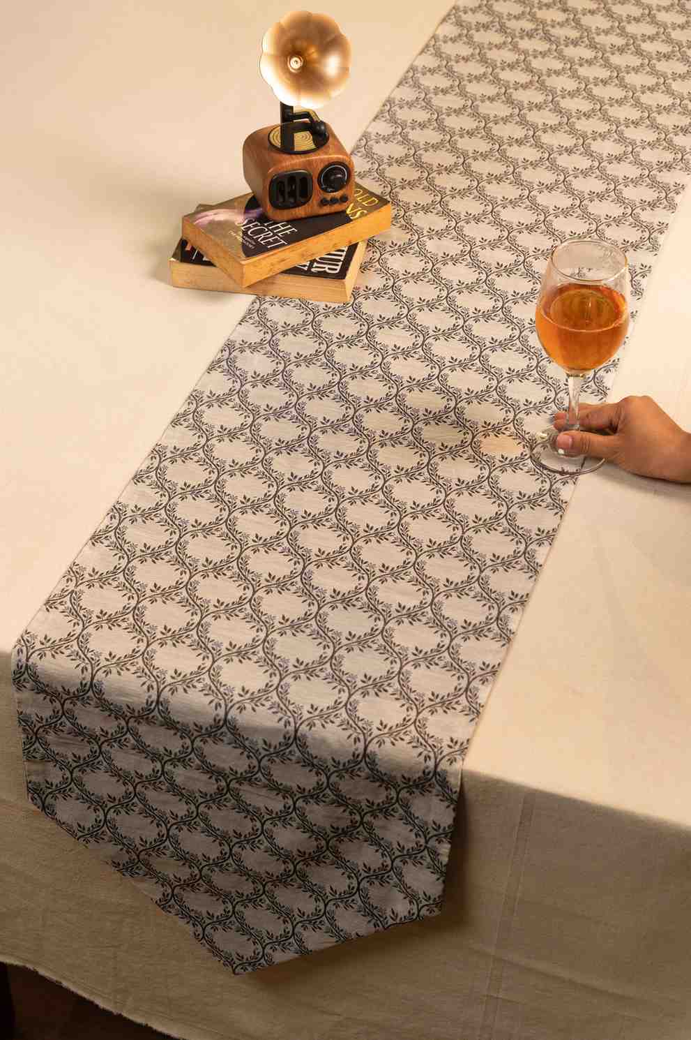 Woven Harmony – Elegant Grey Cutwork Table Linen