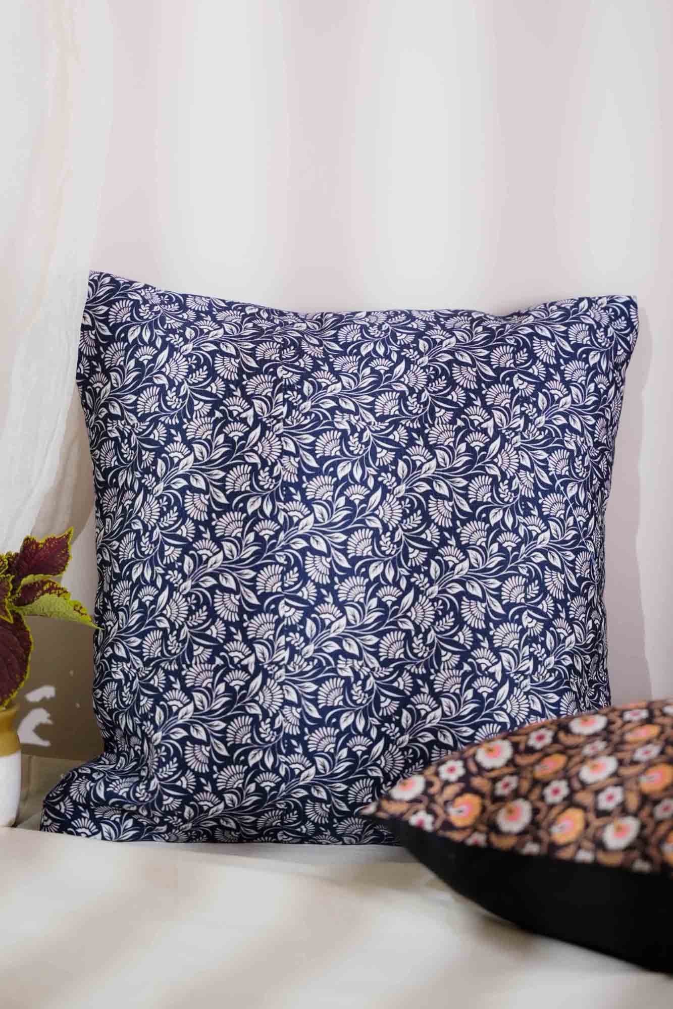 "Indigo Meadows: Blue Floral Cushion Cover"
