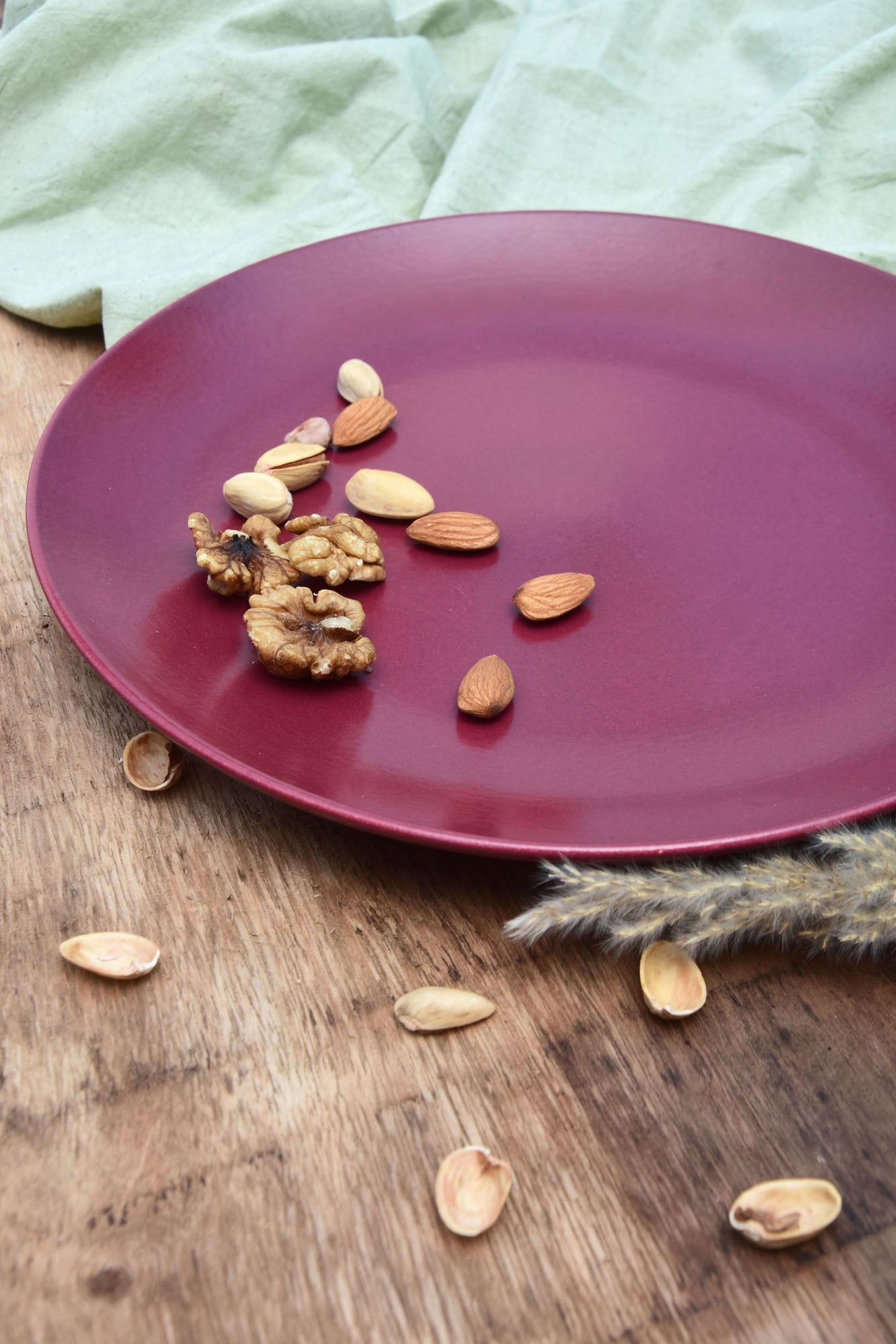 solid maroon ceramic dinner plate