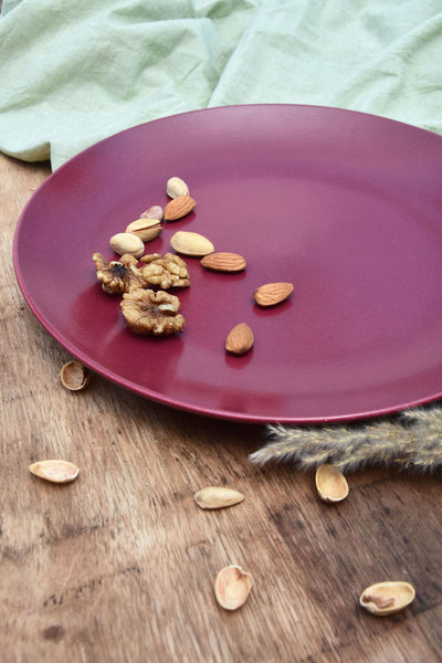 solid maroon ceramic dinner plate